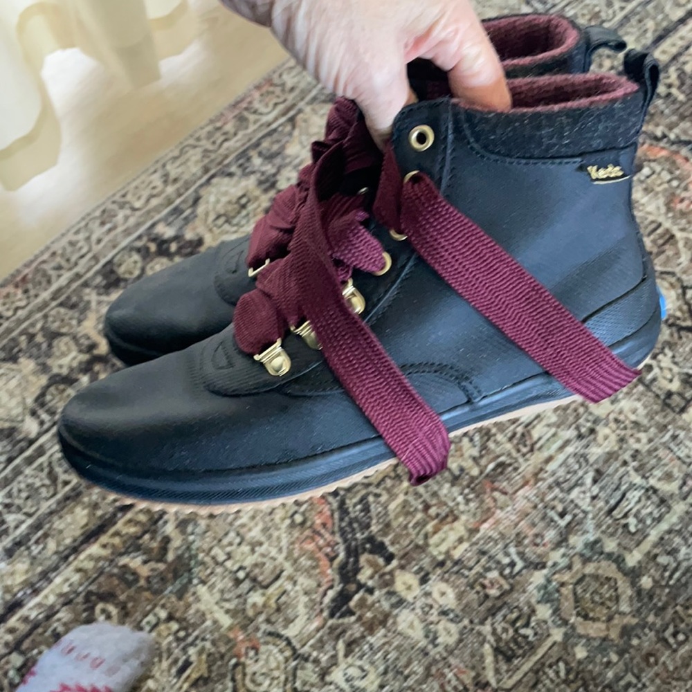 Meds black water proof high top shoes.